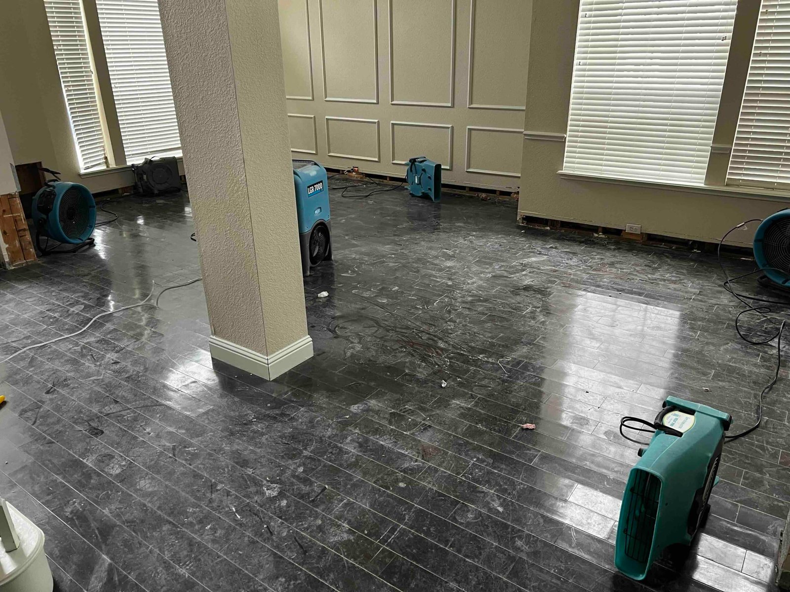 Structural drying equipment in use during water damage restoration in Richardson, Texas